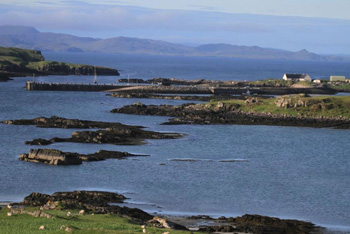 Looking out from the Kildonan Guest House to Eigg harbour and the surrounding bay