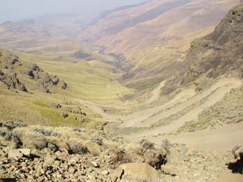 Sani Pass near summit with road zig-zagging away below us.